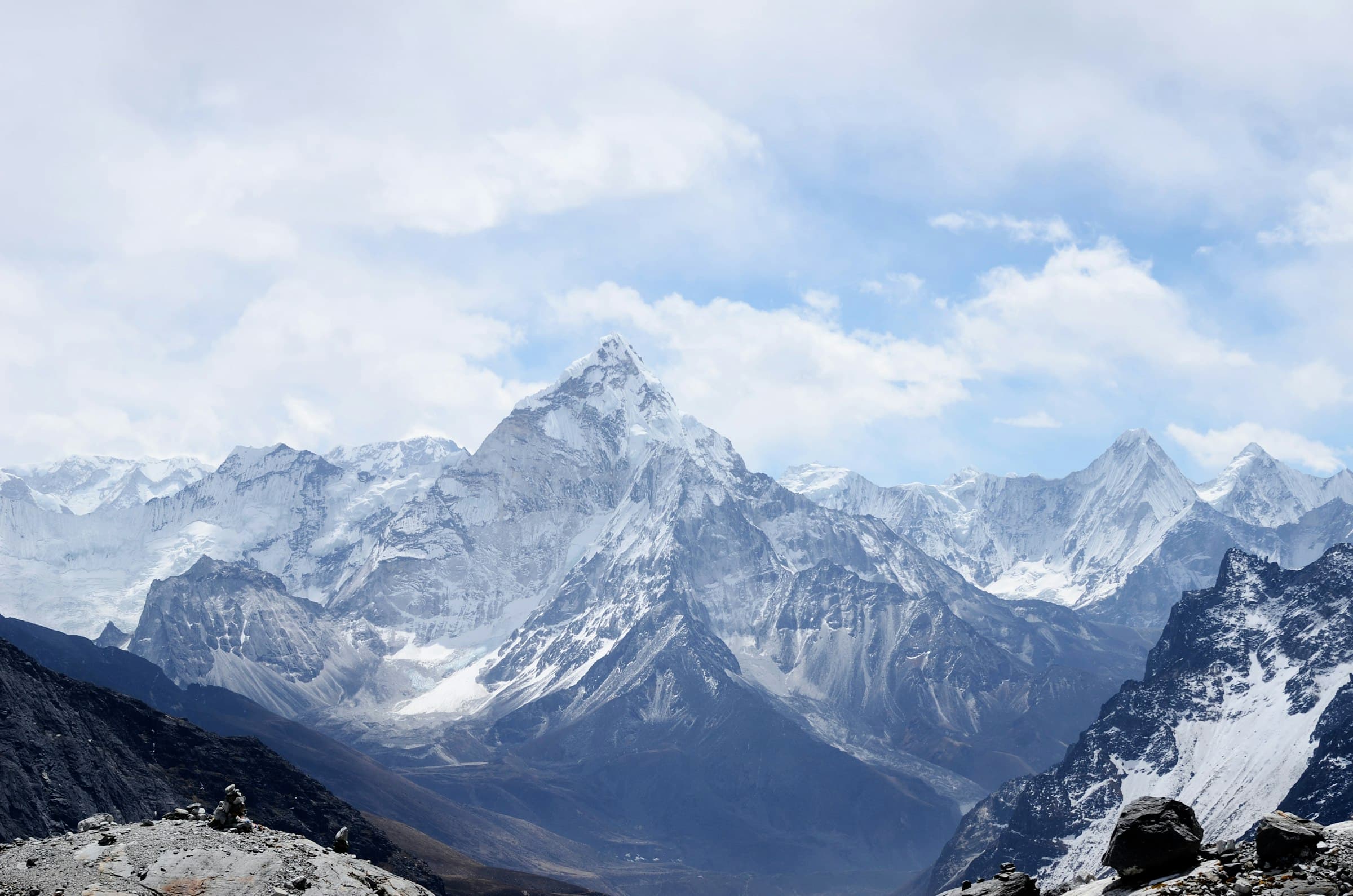 Snowbound Himalayan massif rising above a rocky moraine in the Khumbu